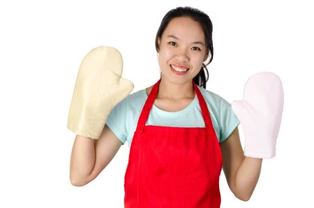 Portrait of woman wear red apron and glove ready to cooking,asian housewifeの写真素材