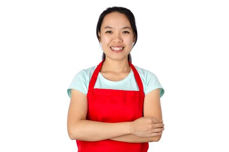 Portrait of woman with red apron ready to cooking,asian housewifeの写真素材