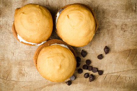Homemade cookies with whipping cream and chocolate chipの写真素材