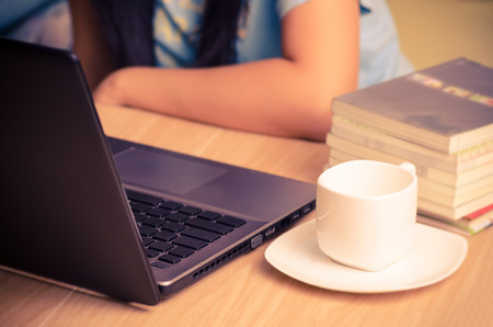 Woman using computer to workingの写真素材