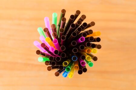 Colorful drinking straw in the glass