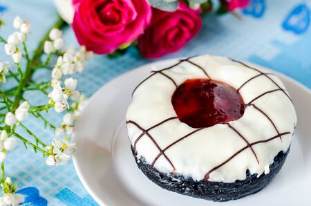 Sweet donut on white plate