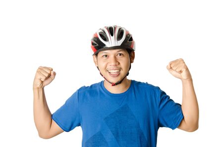 Strong man is wearing bike helmet ready to cycling,isolated on white backgroundの写真素材