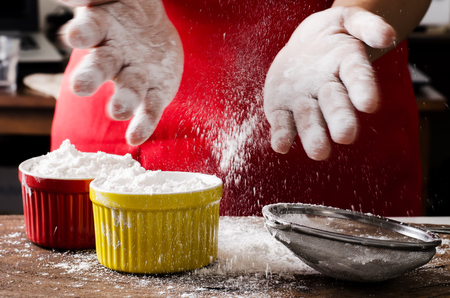 Sifting wheat flour into the bowl,food ingredient,prepare for cooking or bakingの写真素材