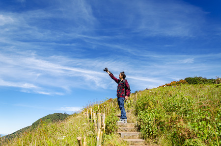 Traveler trekking at Kew Mae Pan Nature Trail (Doi Inthanon National Park),Chiangmai,Thailandのeditorial素材