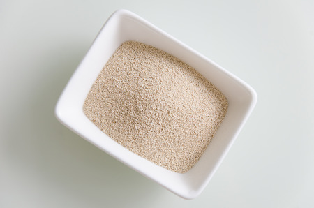Dried yeast in a bowl for bakery cooking,Food ingredient for breadの写真素材