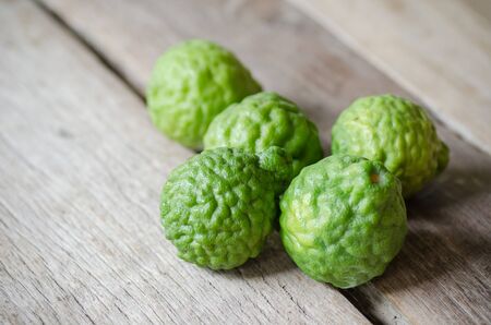 Bergamot fruit on wooden background.Thai herbal plantの写真素材