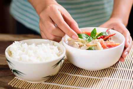 Thai food (Tom Kha Kai), Thai coconut milk soup with chicken and cooked riceの写真素材