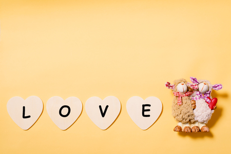 Decoration couple sheep doll and white hearts with loveの写真素材