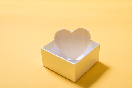 Opened gift box with white heart insideの写真素材