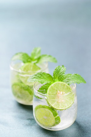 Glass of iced lemonade soda, cold drink in summerの写真素材