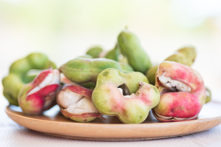 Manila tamarind fruit on wooden plate, Local Thai fruitの写真素材