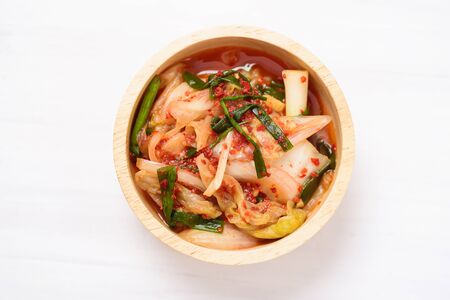 Kimchi cabbage in a bowl on white backgrount, Korean food, top viewの写真素材