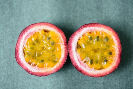 Half passion fruit, tropical and healthy fruit, close upの写真素材