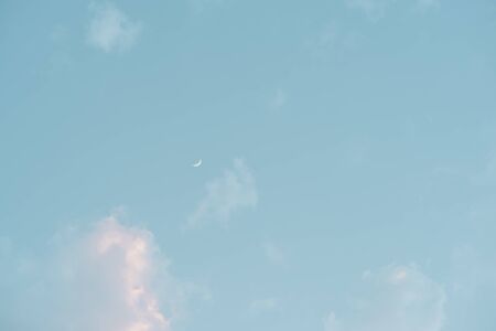 Half moon and blue sky with cloud in the day, minimalism concept, Nature background