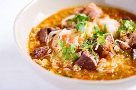 Local Northern Thai food (Kanom Jeen Nam Ngeaw), rice noodles with spicy soup