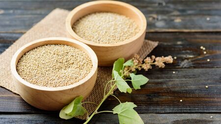 Organic raw brown quinoa seed (Chenopodium quinoa) in a bowl, healthy food