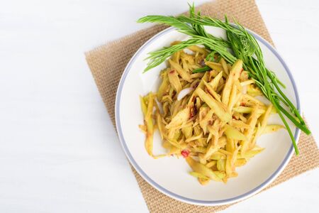 Spicy green mango salad, Thai food (Tum Ma Muang)の写真素材