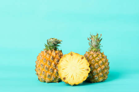 Fresh pineapple fruit on pastel green background, Tropical fruitの写真素材