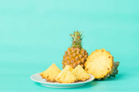 Fresh pineapple fruit on pastel green background, Tropical fruitの写真素材
