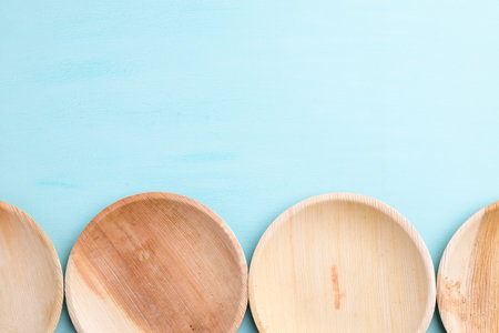Betal palm leaf plate (Biodegradable, Compostable, Disposable or Eco friendly plate) on pastel color background, Sustainable conceptの写真素材