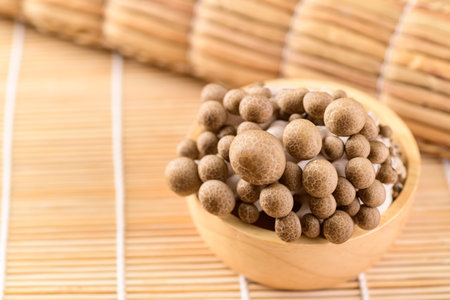 Fresh brown Shimeji mushroom in a bowl, Asian mushroomの写真素材