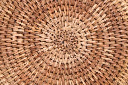 Brown woven rattan pattern texture background, Thai style handicraft from natural productの写真素材