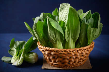 Fresh Bok Choy or Pak Choi (Chinese cabbage) in a basket, Organic vegetables