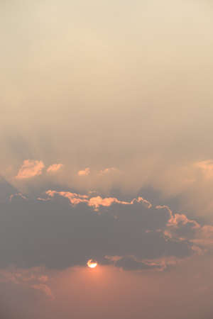 Beautiful vanilla sky with clouds and sunlight before sunset, Nature background