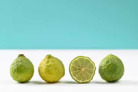 Fresh bergamot fruit on color background, Food ingredients and extract used for medicine, tea, perfumes and cosmeticsの写真素材