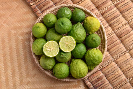 Fresh bergamot fruit in a basket, Food ingredients and extract used for medicine, tea, perfumes and cosmeticsの写真素材