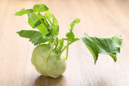 Fresh kohlrabi on wooden background, Organic vegetablesの写真素材