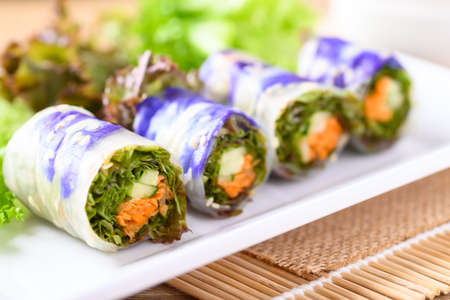 Vegan salad spring roll vegetable with edible flower, Healthy eatingの写真素材