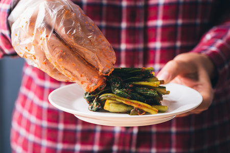 Kimchi mustard green prepare for eating, Homemade Korean fermented side dish foodの写真素材