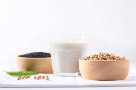 Soy milk with black sesame on white background, Healthy drinkの写真素材