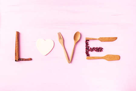 Love made from food ingredient and crokery on pink background, Valentine day concept