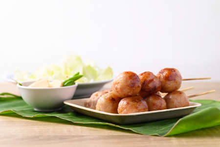 Thai sausage or Isan sausage, grilled fermented rice with minced pork, Popular Thai street foodの写真素材