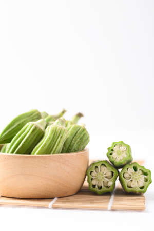 Green okra or ladies fingers (Edible green seed pods), Organic vegetables from local farmer marketの写真素材