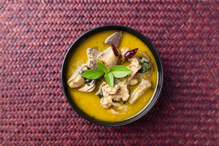 Thai food, Green curry chicken in a bowl, Table top viewの写真素材