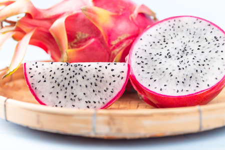 Fresh dragon fruit or pitaya in bamboo basket, Tropical fruitの写真素材
