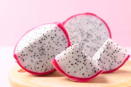 Close up of sliced dragon fruit or pitaya on wooden, Tropical fruitの写真素材