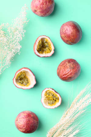 Passion fruit on pastel color background, Tropical fruit in summer season, Flat layの写真素材