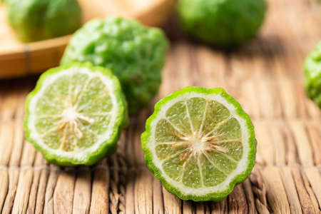 Organic Kaffir lime, Citrus fruit used in Southeast Asian cuisine and essential oil
