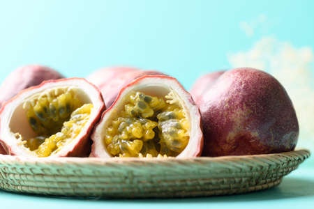 Passion fruit in basket on pastel color background, Tropical fruit in summer season