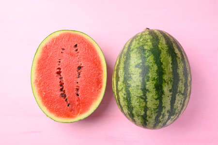 Watermelon on pink color background, Tropical fruit in summer season