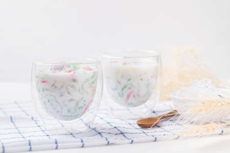 Thai dessert (Lod Chong), Colorful rice flour jelly with coconut milk in glassの写真素材