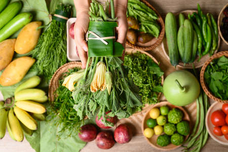 Organic Southeast Asian vegetables and fruits from local farmer market in summer season, Northern of Thailand, Sustainability conceptの写真素材