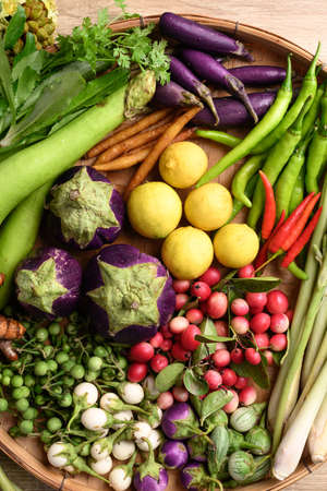 Organic Southeast Asian vegetables from local farmer market in Thailand, Sustainability concept, Table top viewの素材 [FY310187316341]