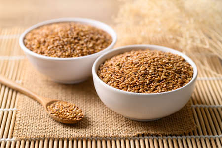 Golden flax seed or linseed in bowl, Food ingredientsの写真素材