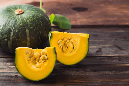 Green pumpkin on wooden background, Organic vegetableの写真素材